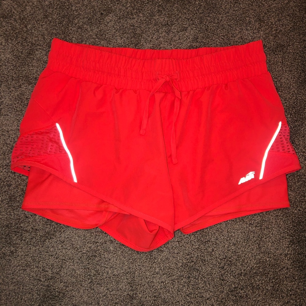 Never been worn neon coral Avia shorts